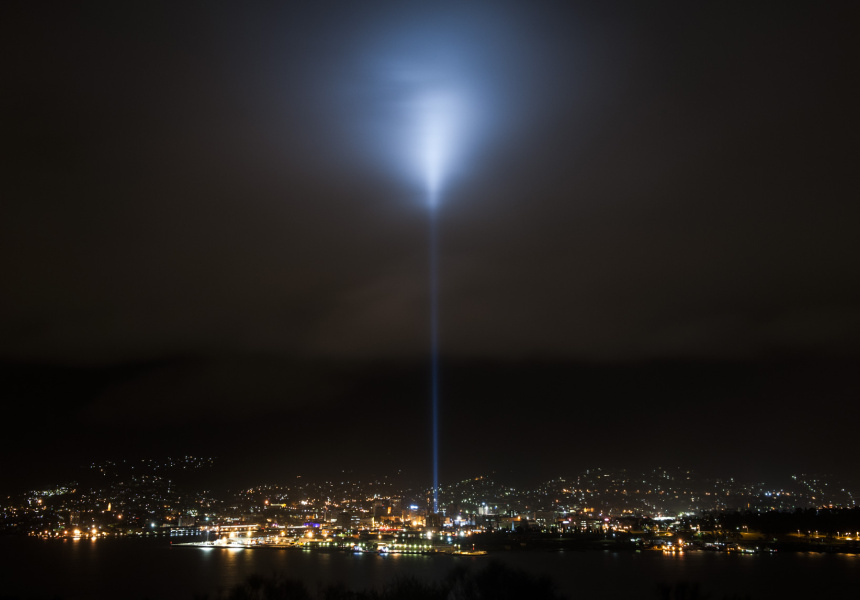 Rafael Lozano-Hemmer's Pulse Column lights up the night sky over Hobart.
