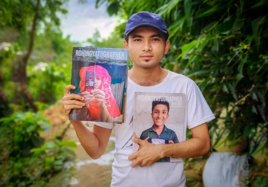 Sahat Zia Hero with issues one and two of Rohingyatographer Magazine

