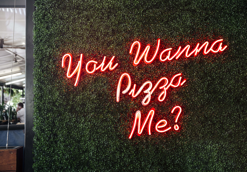 you wanna pizza me neon sign