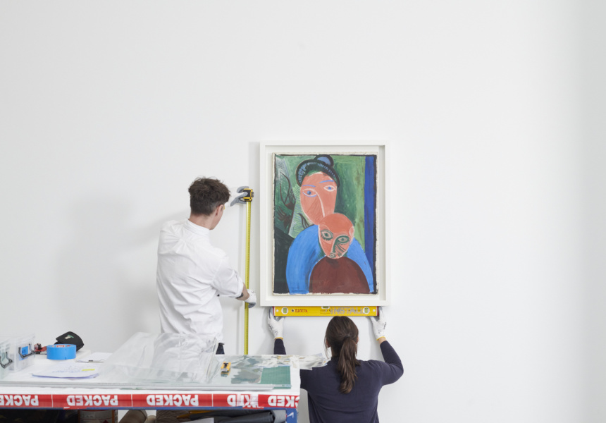 NGV installers David Mutch and Tess Campbell installing Pablo Picasso’s Mother and child (Mère et enfant) 1907 from Musée national Picasso–Paris in The Picasso Century open from 10 June – 9 October at NGV International, Melbourne. 
