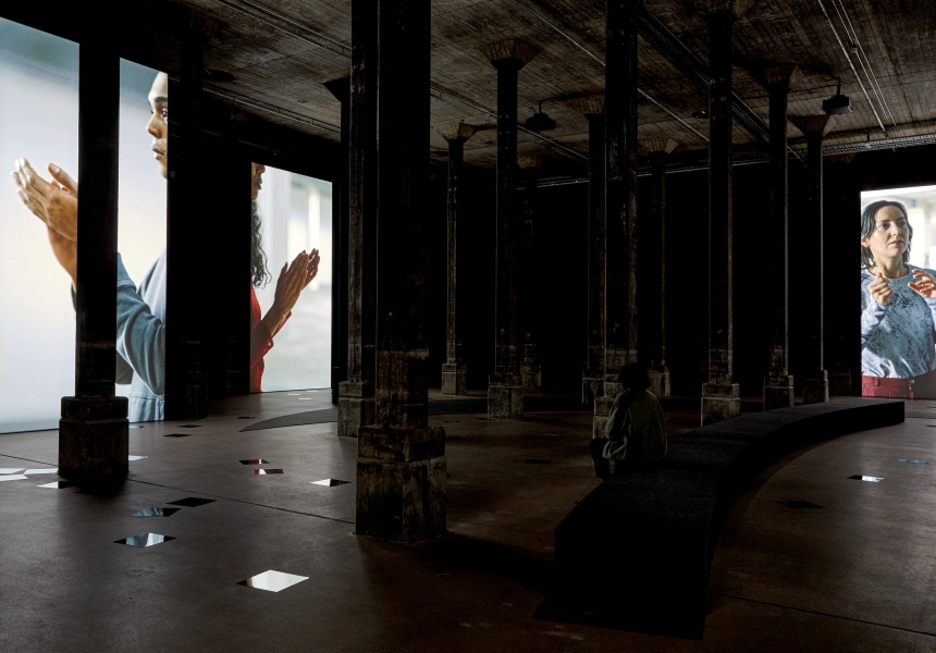 Installation of Angelica Mesiti 'The Rites of When' 2024, collection of the artist, commissioned by the Art Gallery of New South Wales for the Nelson Packer Tank, 2024 © Angelica Mesiti, photo © Art Gallery of New South Wales, Jenni Carter
