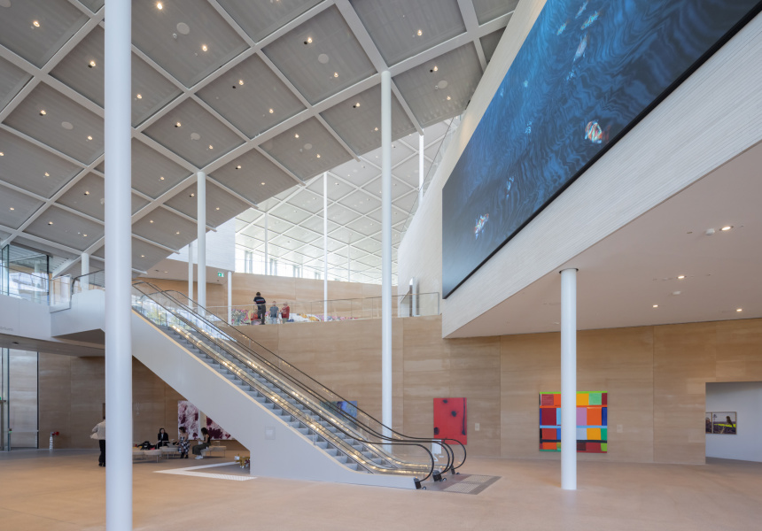 Interior view of the Art Gallery of New South Wales’ new SANAA-designed building, featuring works by (lower wall, left to right) Lindy Lee and Stanley Whitney and (upper wall) Lisa Reihana, 2022