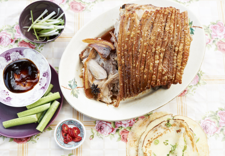 Spiced, slow-cooked pork shoulder with spring onion pancakes 
