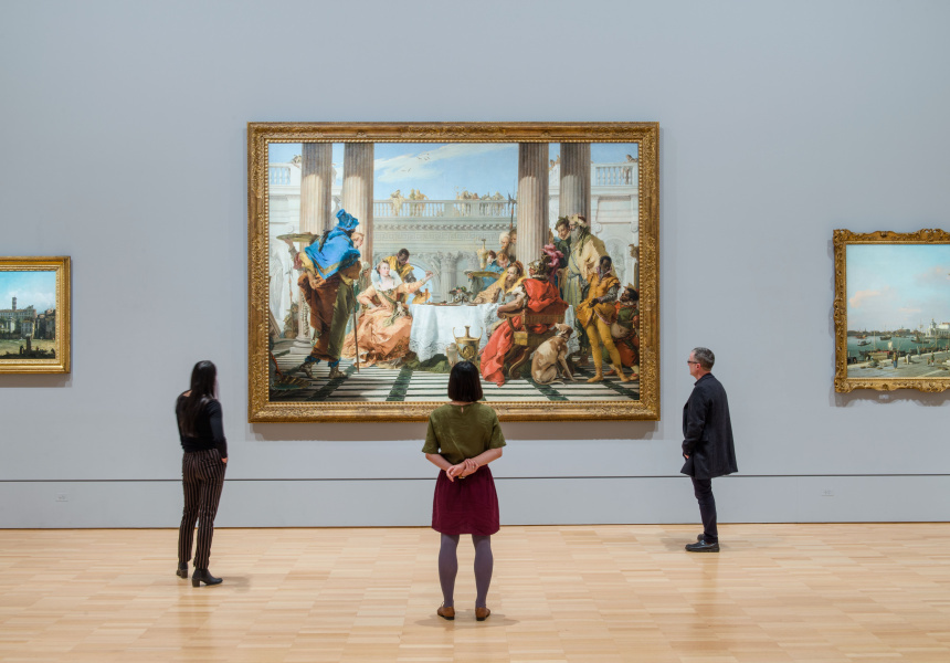 Visitors viewing Giambattista Tiepolo’s The Banquet of Cleopatra (1743–44) at NGV International
