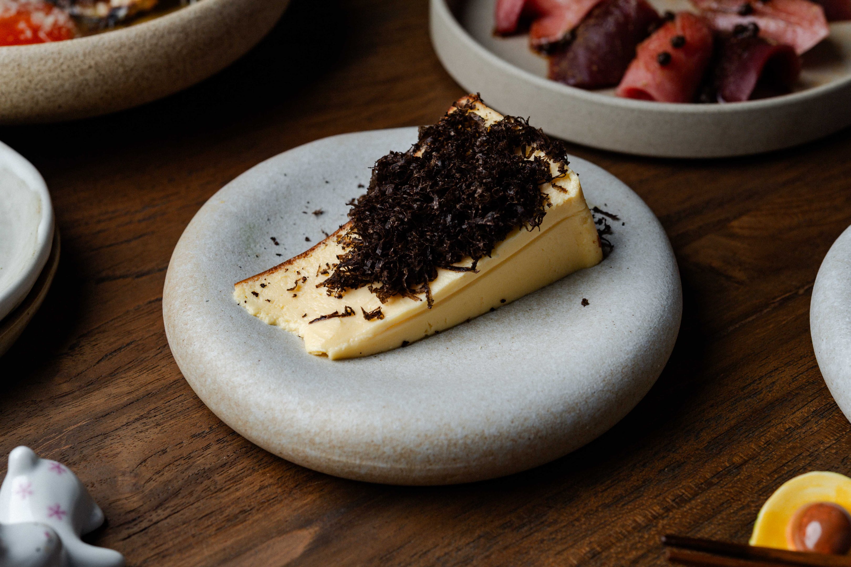 Black truffle Basque cheesecake. Photo: Yusuke Oba