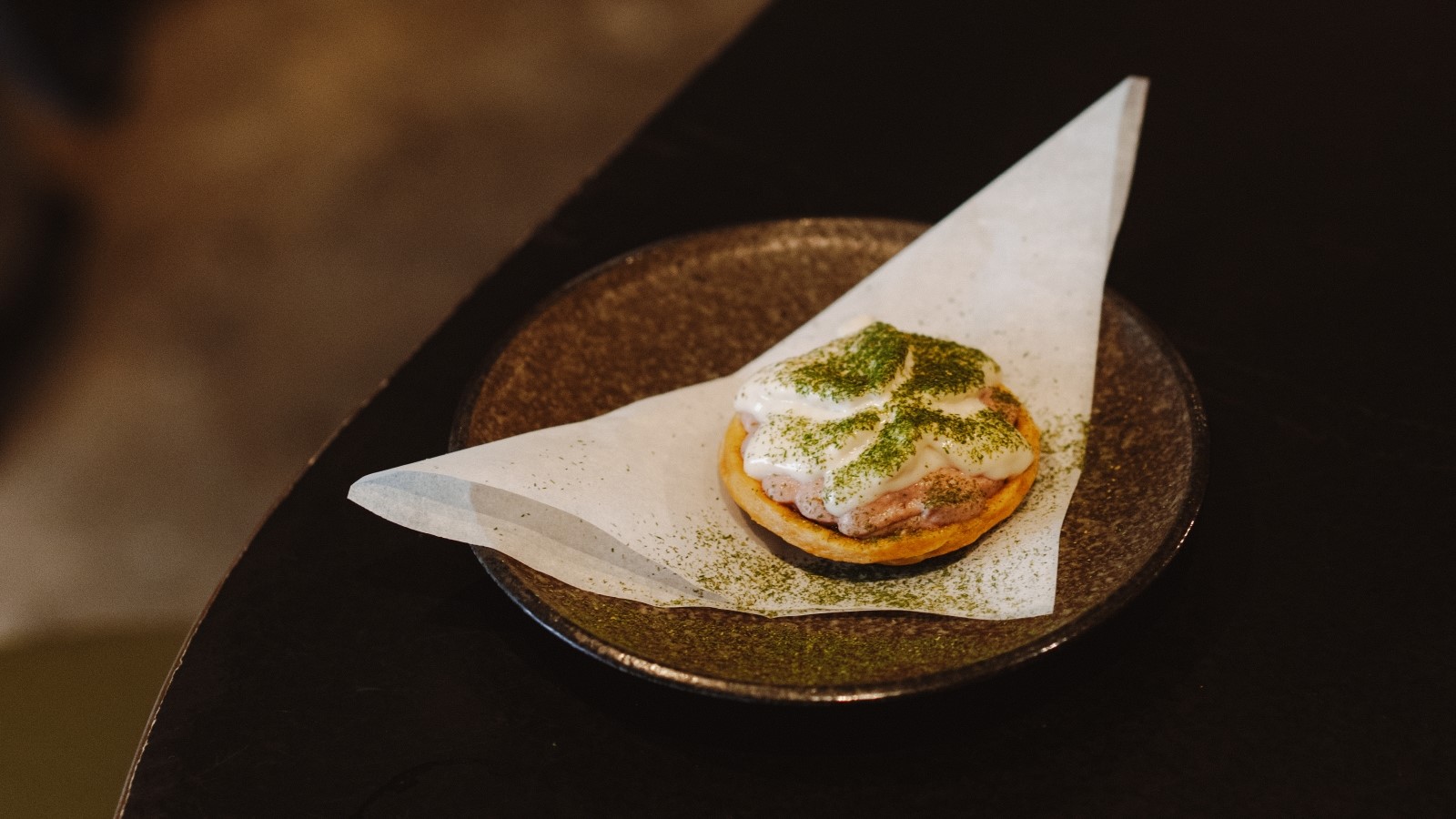 A tart at Singapore bar No Sleep Club, with kumquat compote, aerated coconut cream and Vow’s cultured Japanese quail parfait. Photo: courtesy of Vow