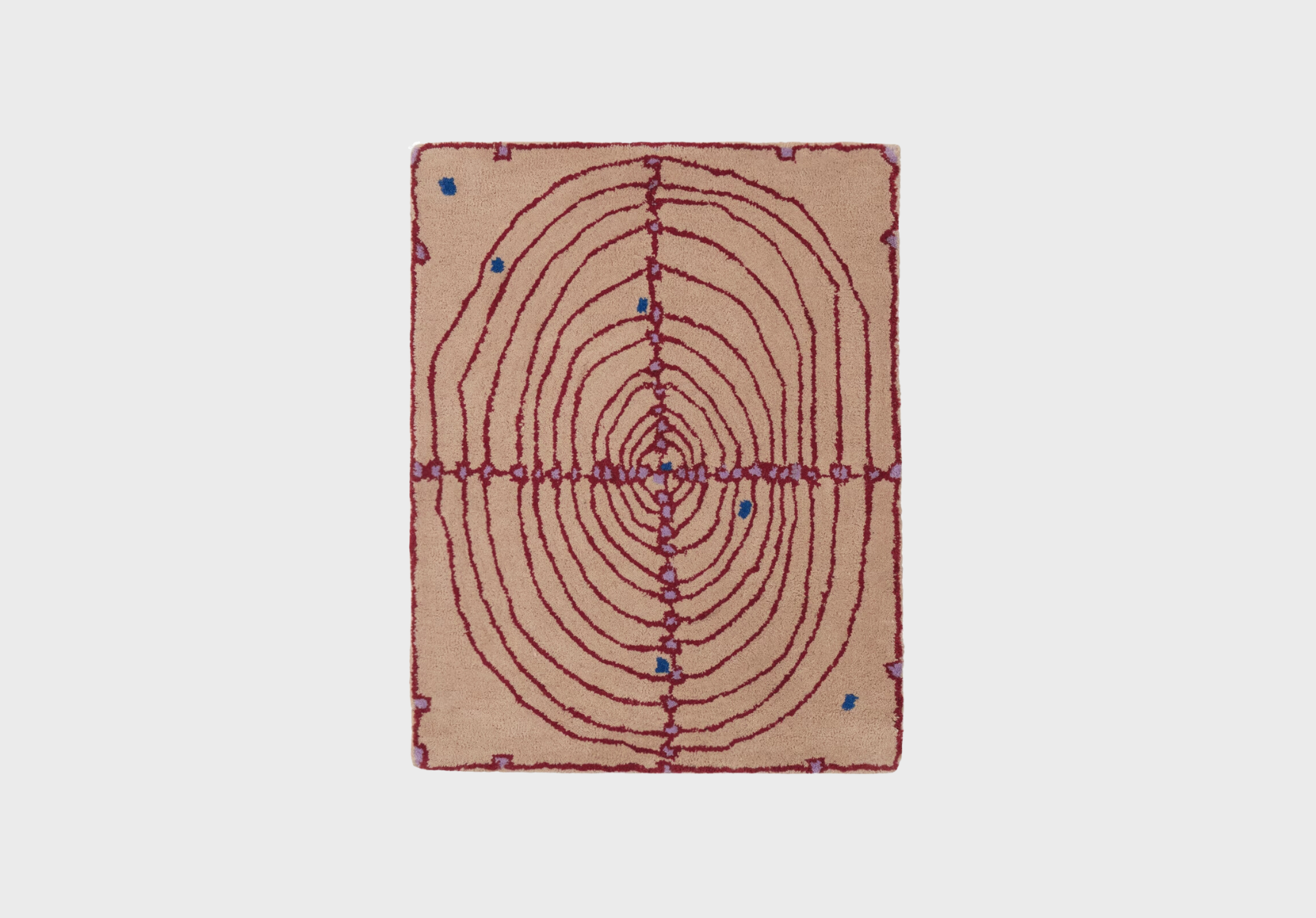 Maki Rugs beige and red bullseye rug