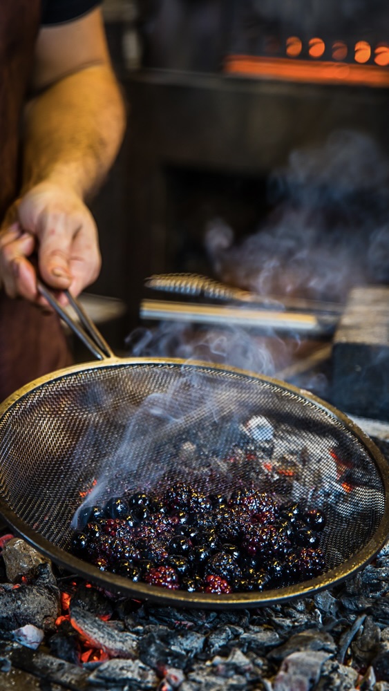 ”We've created a lot of implements over the years to find ways to warm delicate ingredients over fire.” Photo: Courtesy of Firedoor / Nikki To