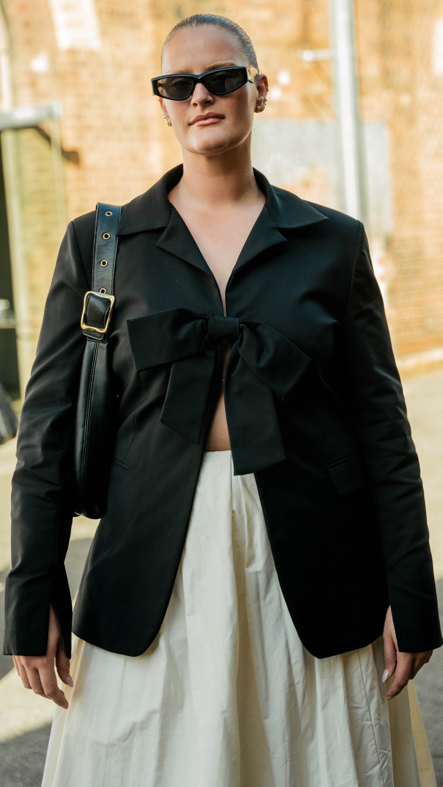 Sarah had her blazer custom-tailored in Vietnam, because suiting doesn’t have to be standard. Photo: Liana Hardy