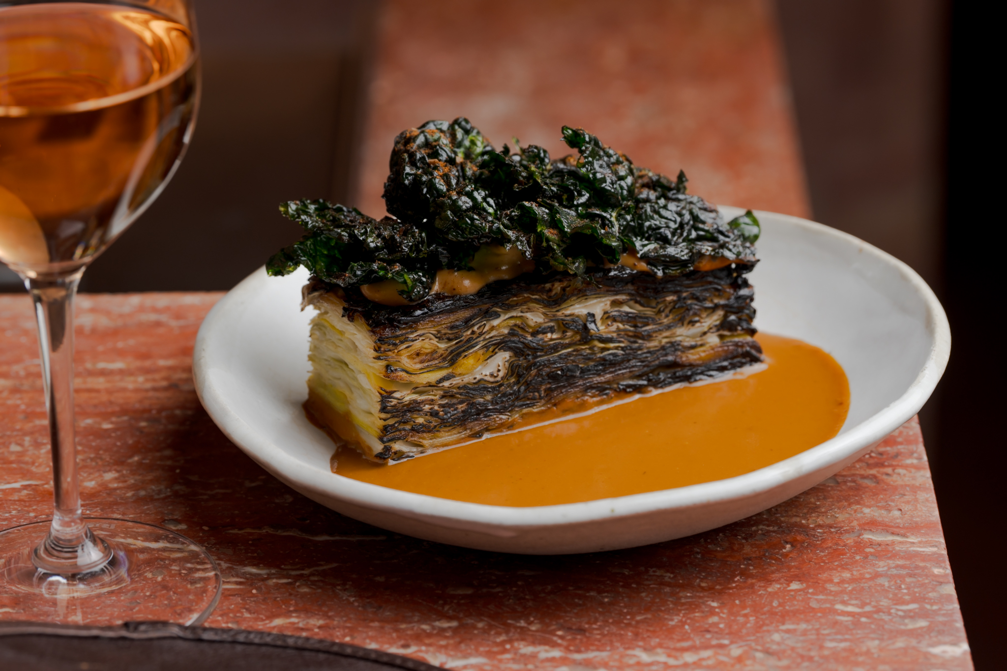 Layered cabbage with pipian rojo sauce.